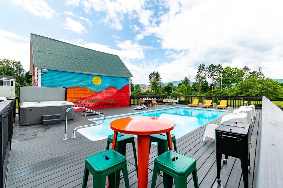[Exterior, Backyard] Come and experience our newly renovated pool space, which now includes a Jacuzzi hot tub! Our pool is open Memorial Day through Labor Day, while our hot tub is open year-round.