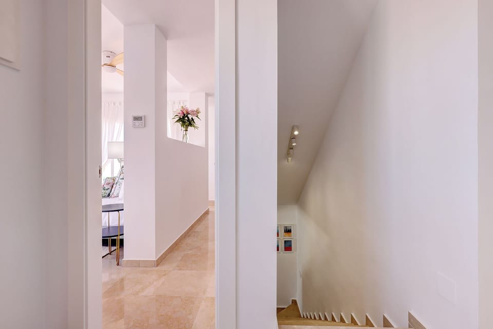 Walk upstairs for additional 2 Bedrooms and wrap around terraces