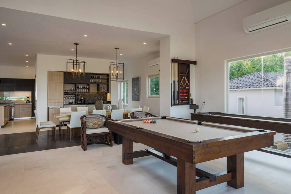 Pool table, shuffleboard table, dining table, minibar