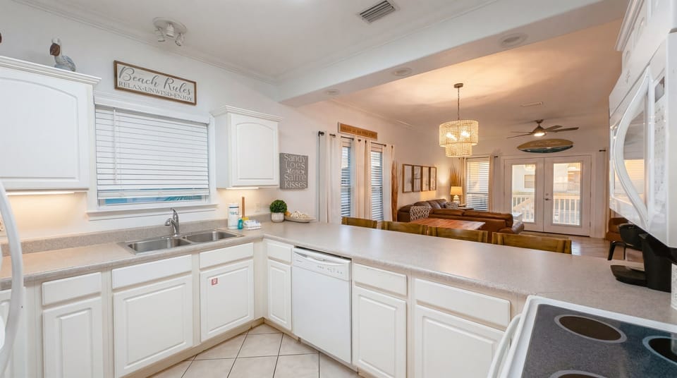 Fully equipped kitchen with plenty of counter space and everything needed to prepare meals during your stay.
