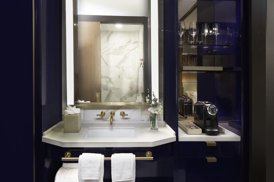 Refresh your morning routine with stylish vanity and coffee setup.