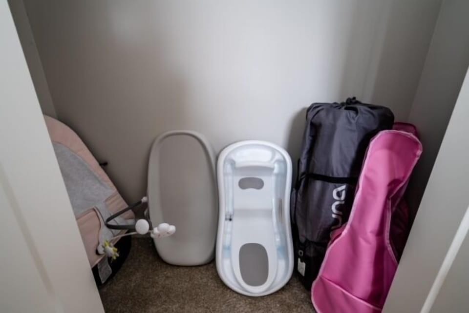 High-End Baby Gear and Essentials Including a Changing Pad, Baby Bjorn Bouncer and Nuna Sena Travel Crib