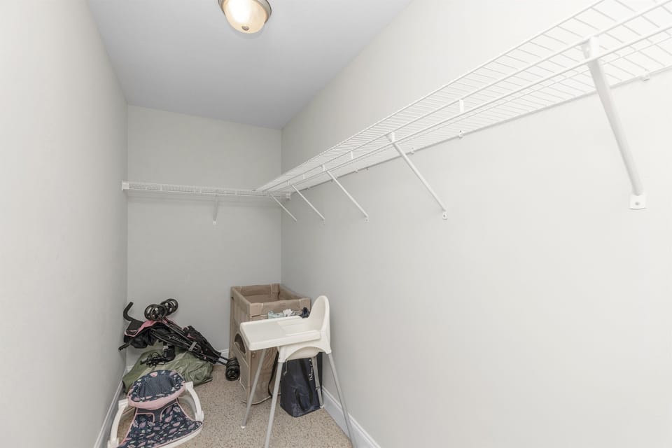 Master closet w/stroller, high chair, pack n play with sheets, bassinet, queen air mattress. It's not in the picture, but added a pet kennel