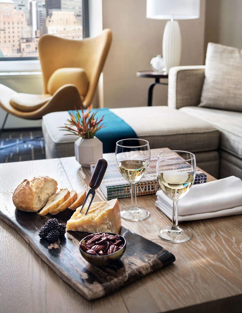 Sip wine and share bites while lounging after city adventures.