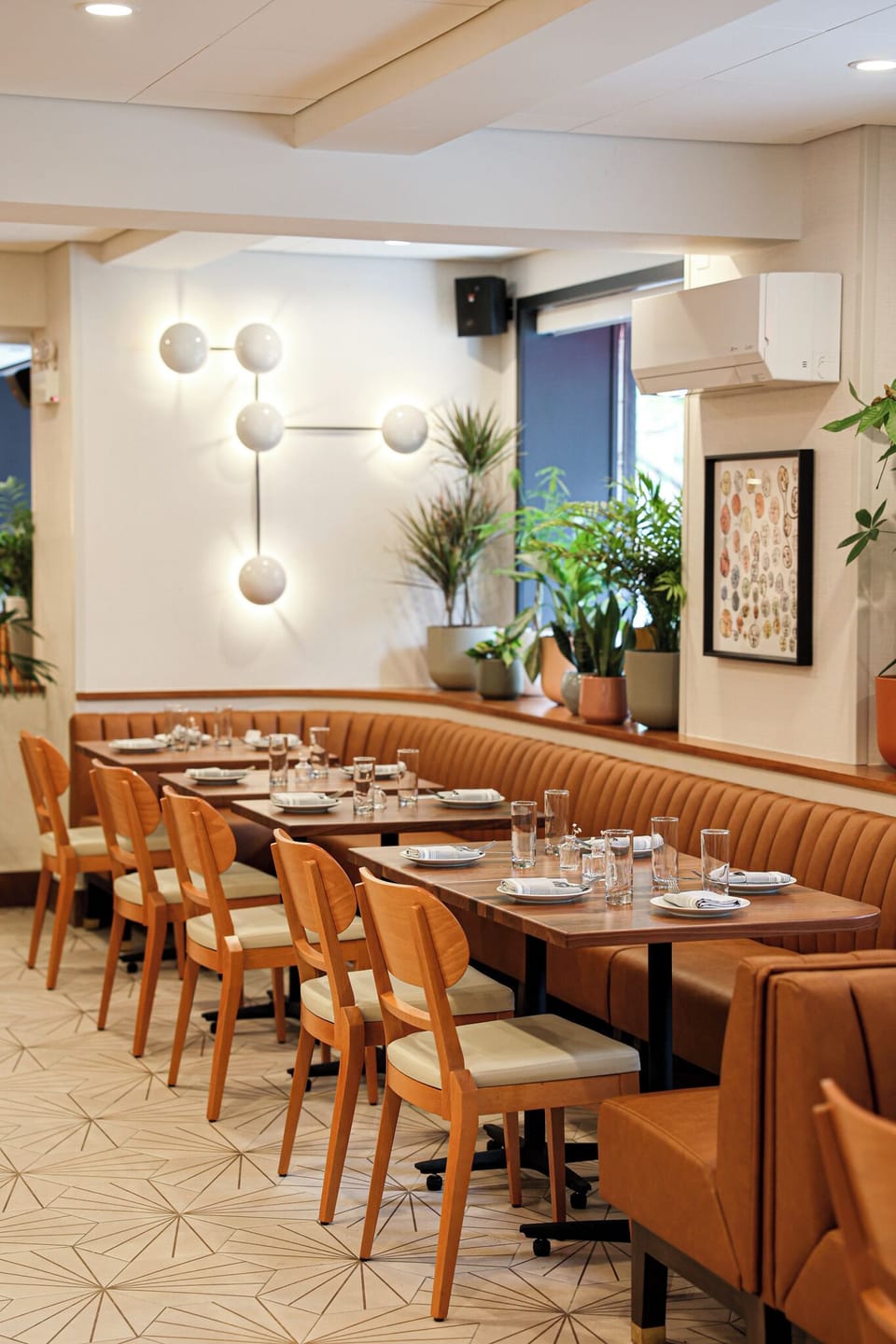 Settle into cushioned banquettes for a relaxed, lingering meal.