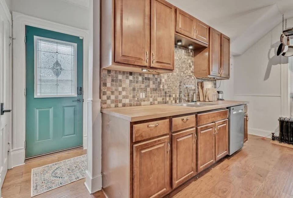Kitchen.   Back door to hotTub.   Back set of stairs.  