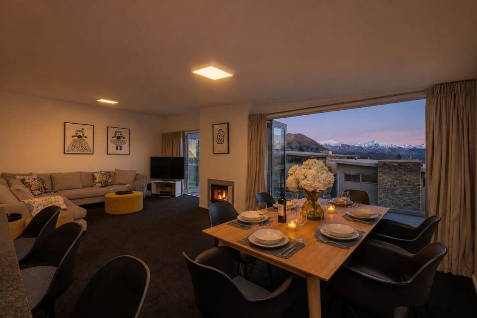 Golden hour over Wanaka - pour a glass and watch the mountains glow from your living room