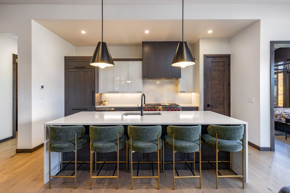 Stunning Chef's kitchen, features Wolf 48' gas range with dual convection ovens!