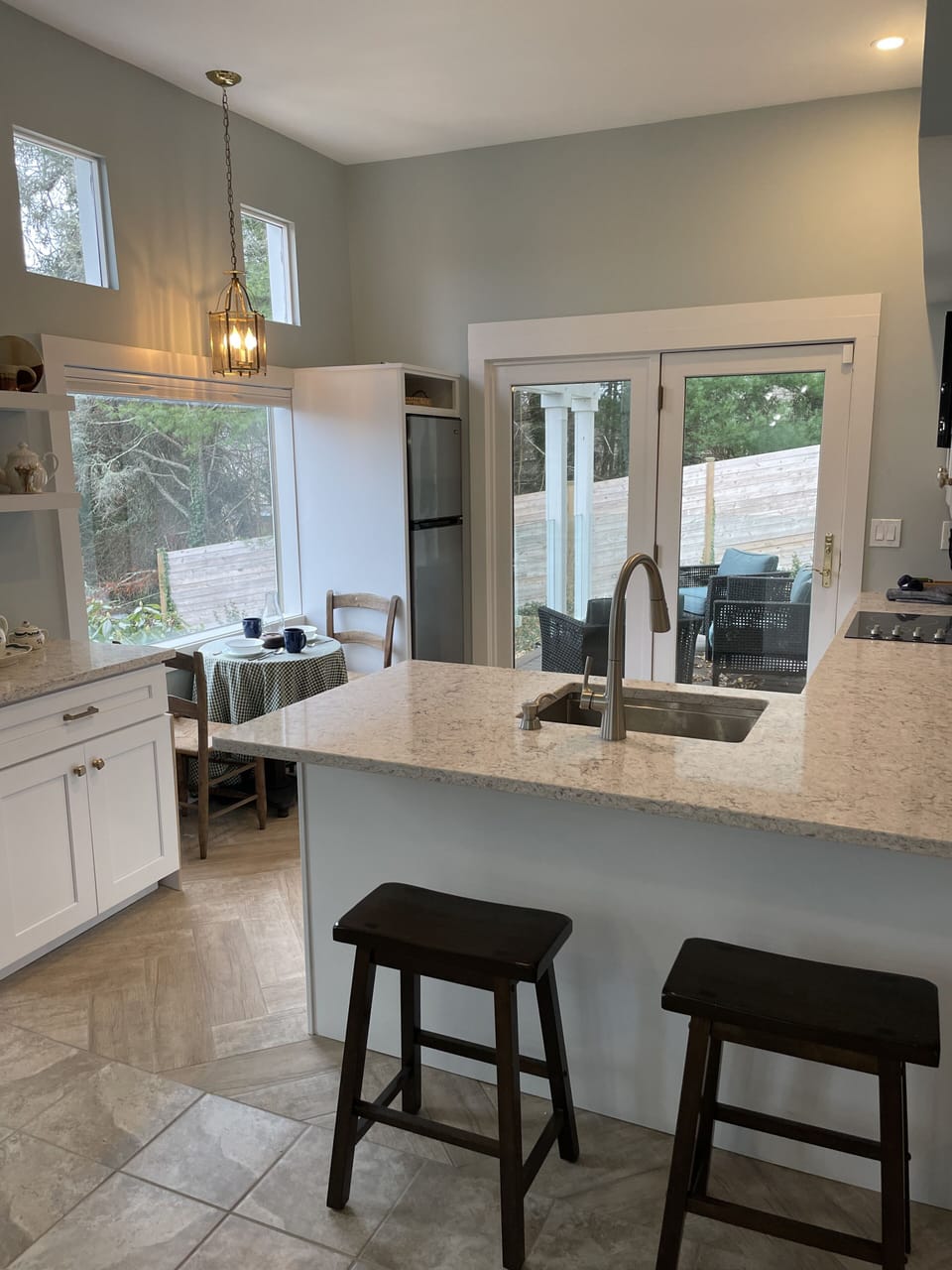 Doors off the kitchen lead to the covered porch.