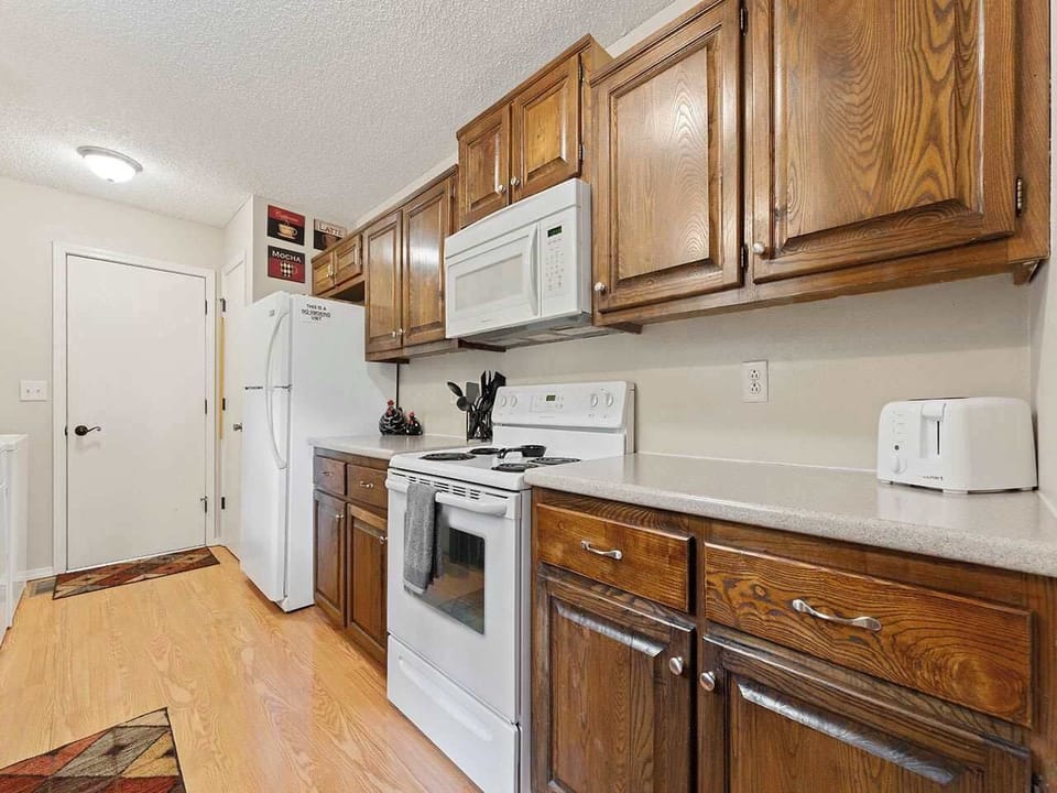 Kitchen connects to the garage which is great for bike storage.