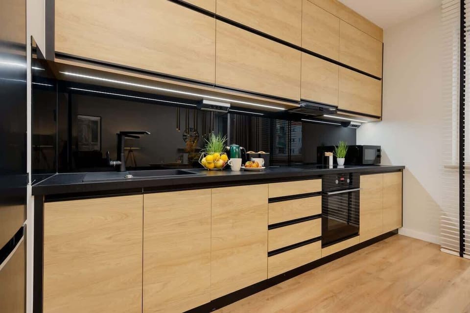 Cook and dine in style with the modern kitchenette and dining area.