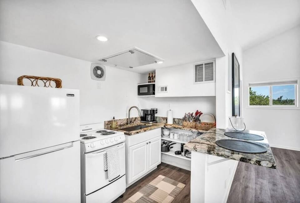 Quaint kitchen with everything you need for a long or short stay. 