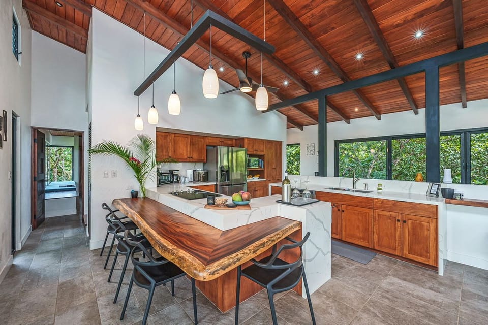 Breakfast bar offers additional seating in the Kitchen
