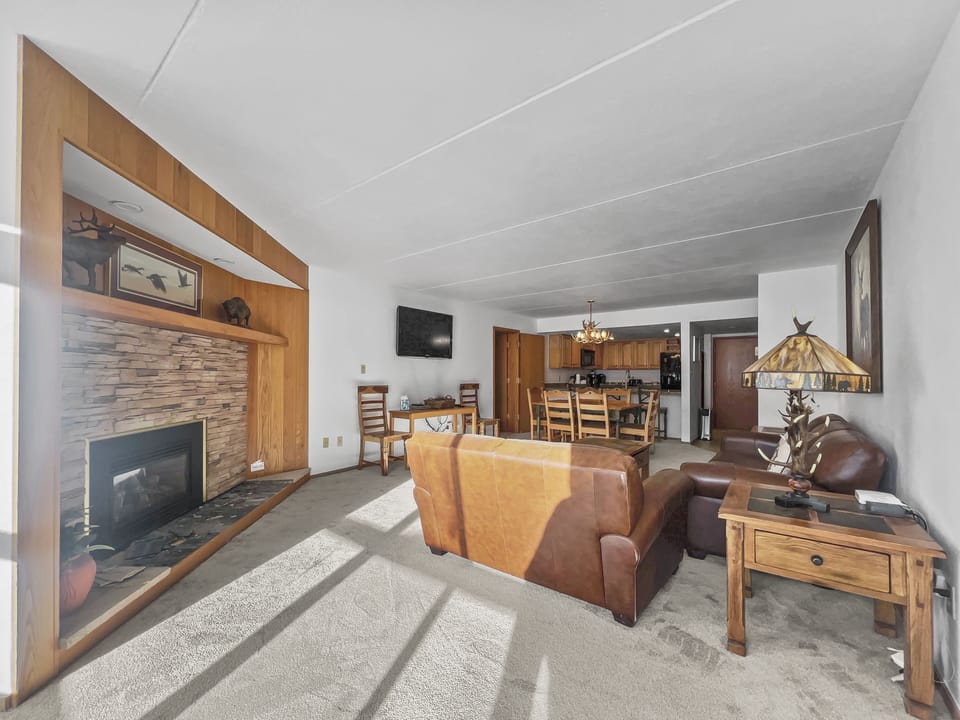 Cozy living room with fireplace.