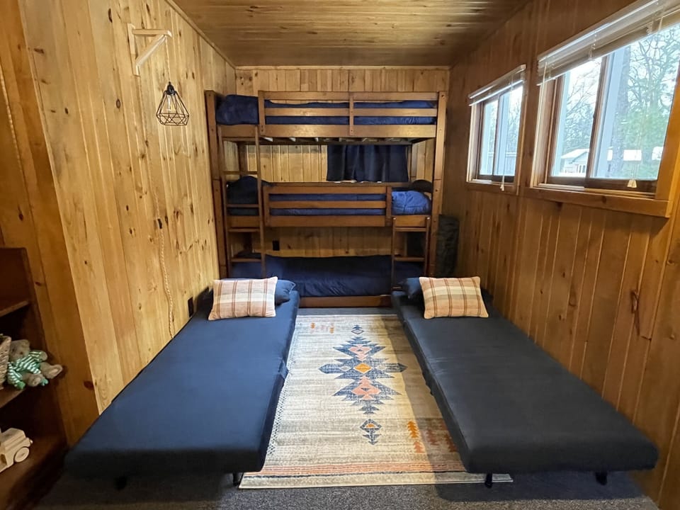 Chairs fold out for cot-sized beds. Memory foam mattress topper and bedding provided for each.