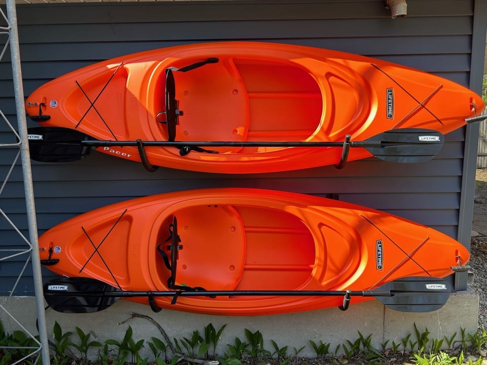 Four total kayaks available for guest use on Torch Lake.