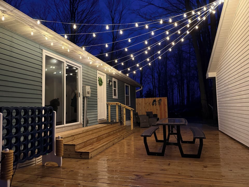 Expansive deck for eating, games, and relaxing.