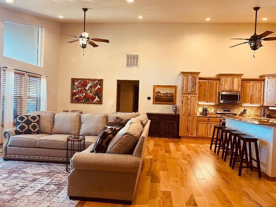 Kitchen overlooks the living room and back deck.