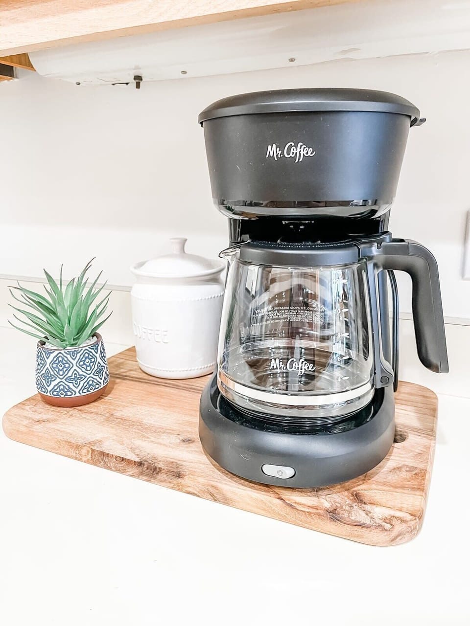 We provide a coffee maker, coffee filters, coffee and sugar.