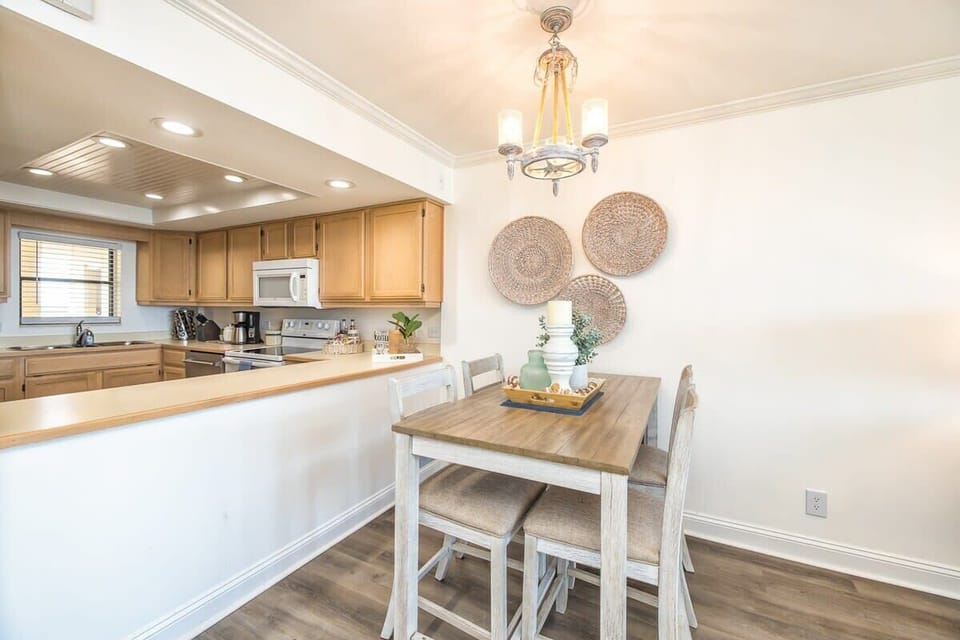 Our dining space is adjacent to the kitchen, so you can easily access all the amenities our kitchen offers and still enjoy the gorgeous views. 
