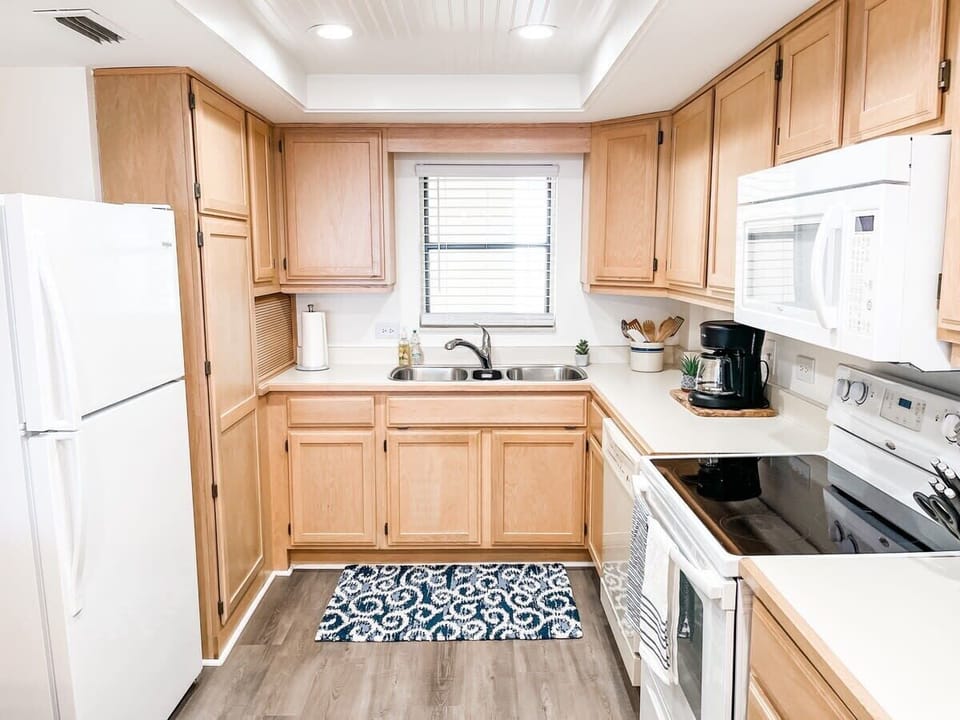 Kitchen is fully stocked: includes coffee maker, coffee, sugar and cream.