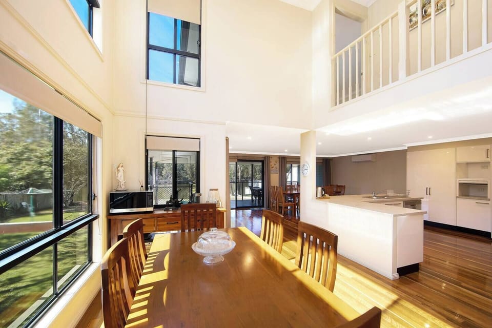 The ground floor is open plan flowing to the backyard and is brimming with natural light.
