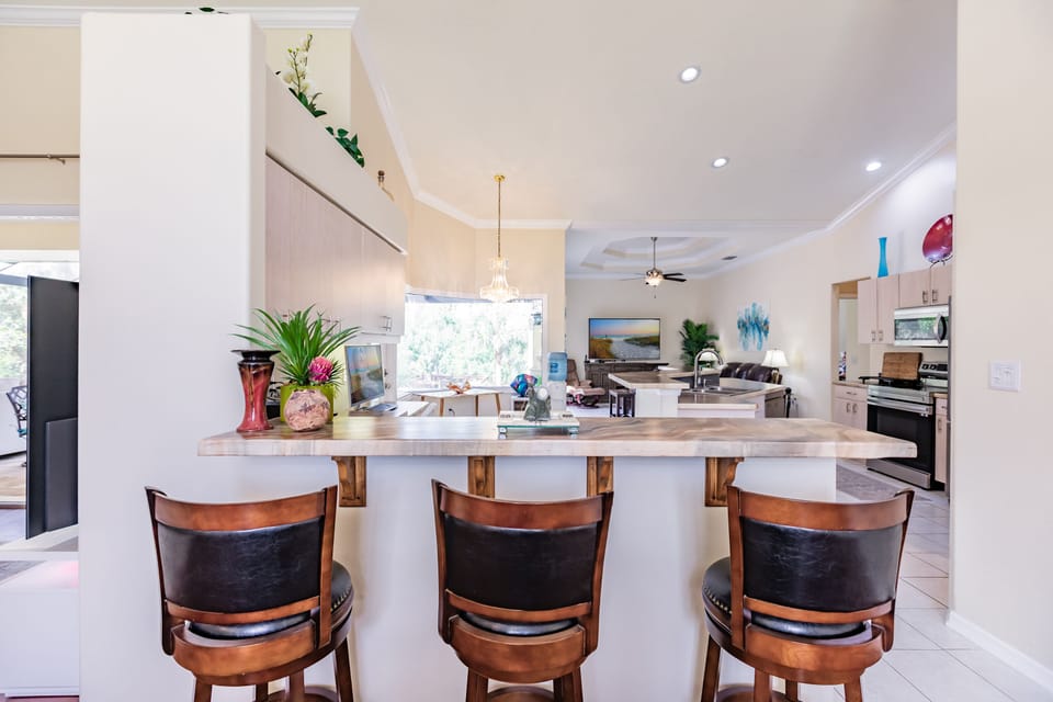 View from Dining Room, Bar counter, into Kitchen.