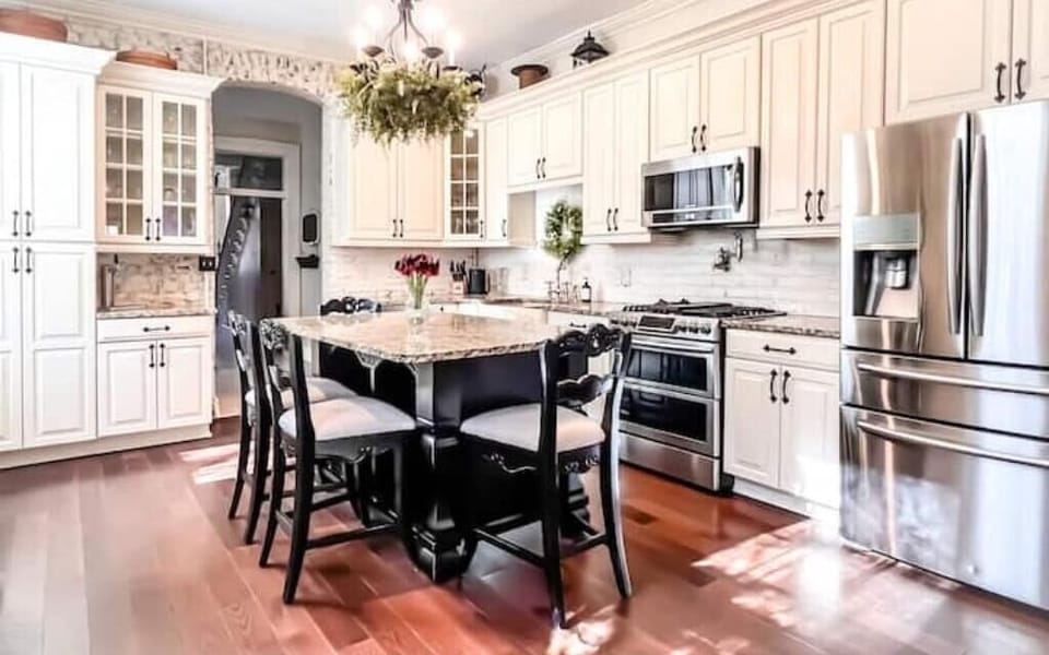 Additional view of the large fully stocked kitchen 