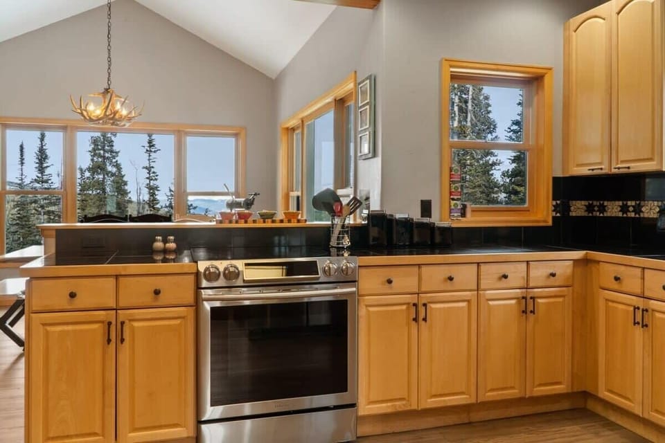 The spacious kitchen overlooks the dining room and living room keeping the chef central to it all while they prepare meals.