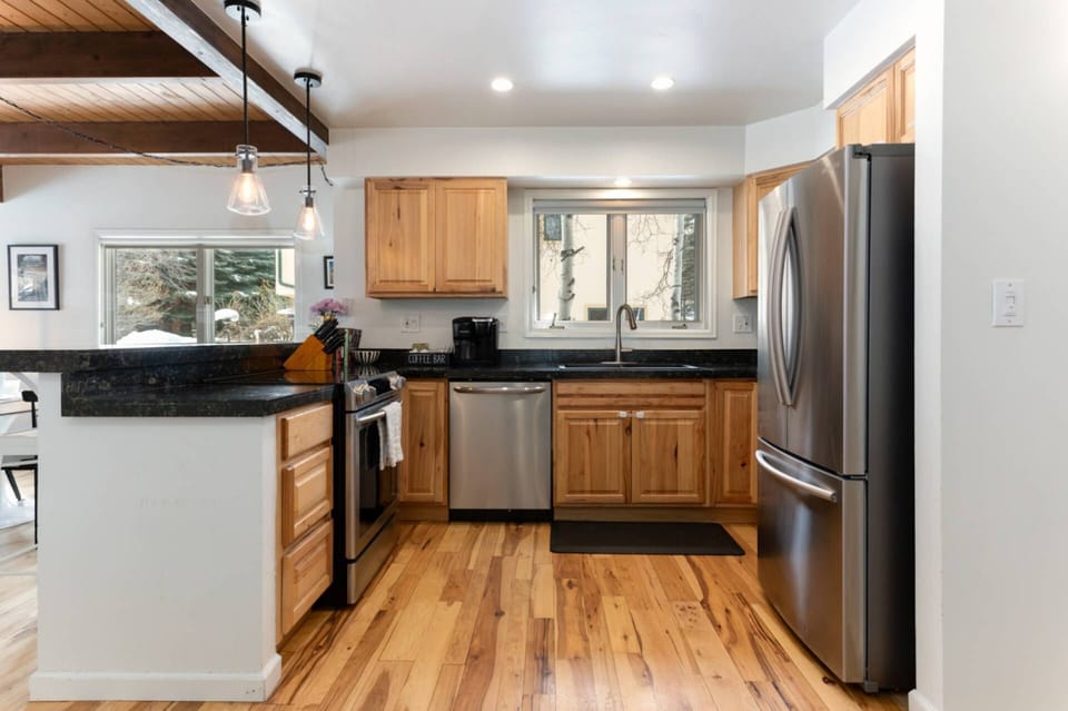 Prepare culinary delights in this fully equipped kitchen, where every meal becomes a masterpiece.