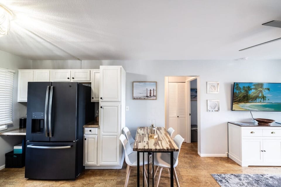 Full-sized refrigerator and seating for 4