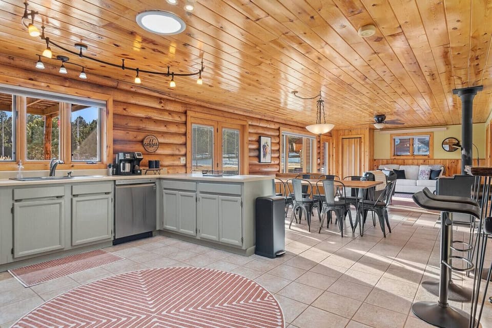 Airy open kitchen layout seamlessly blending with the living space, ideal for modern living and entertaining.