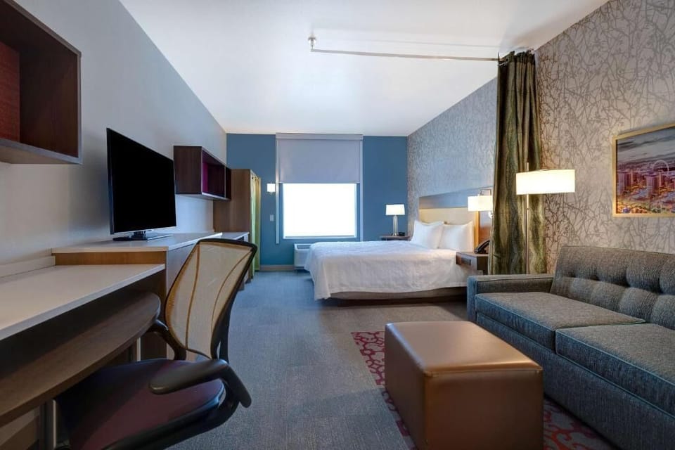 Sink into a king bed in an airy, modern room.