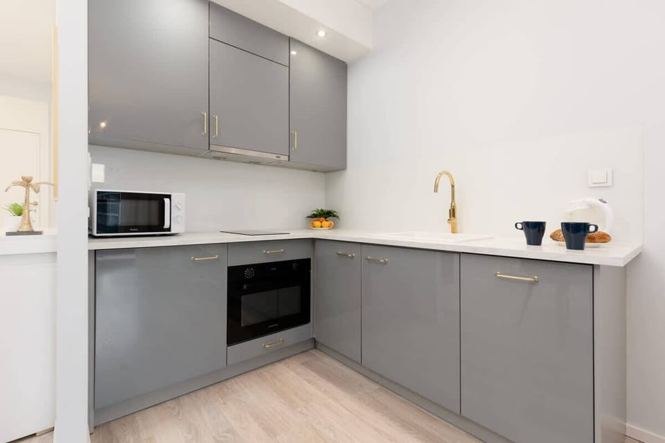 The fully equipped kitchenette includes everything you need for a home-cooked meal.