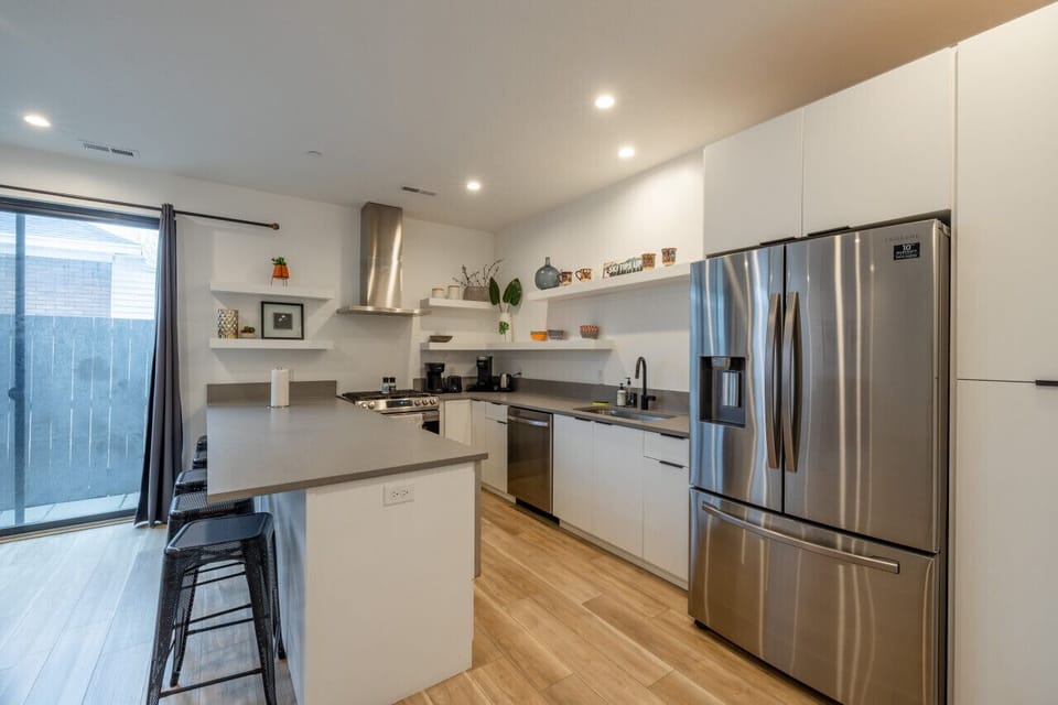 Bright, open, and fully equipped — the heart of the home for shared meals and conversation.