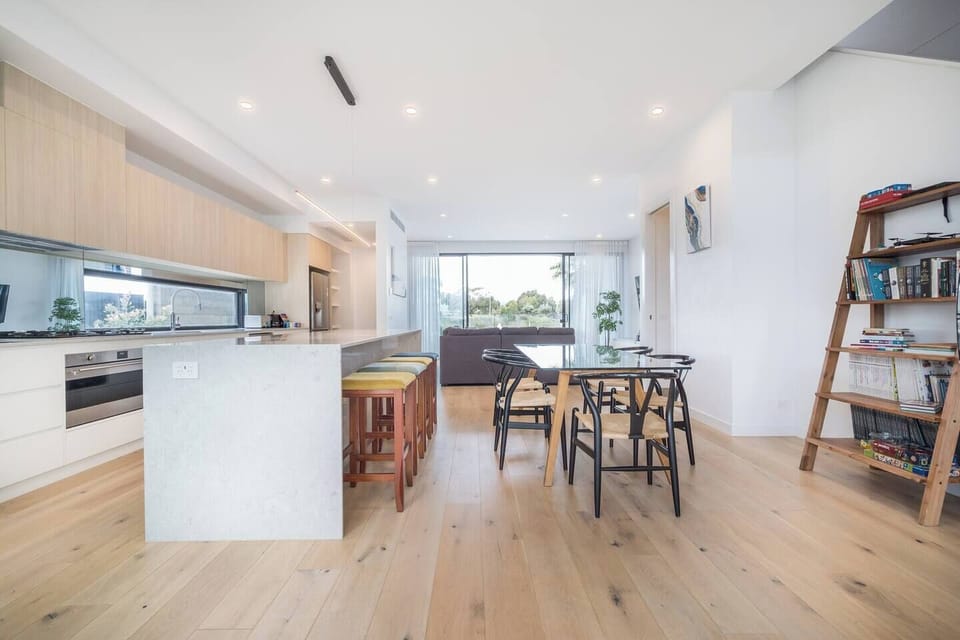 Open-plan living and dining invites the whole group to come together for meals, movie nights and board games.