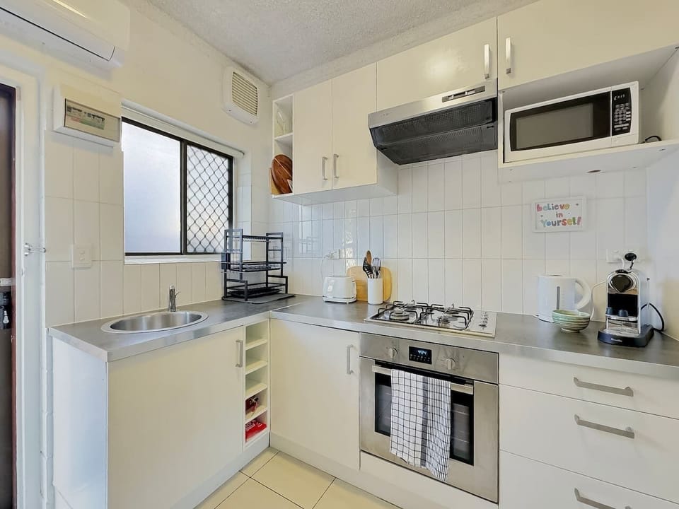 Whip up culinary delights in the kitchen, equipped with appliances, ample counter space, and all the essentials for a home cooking experience.
