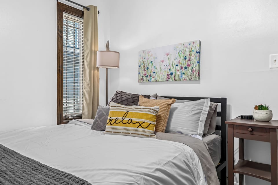 This bedroom is the perfect place to read a book, take a nap, or just enjoy some peace and quiet.