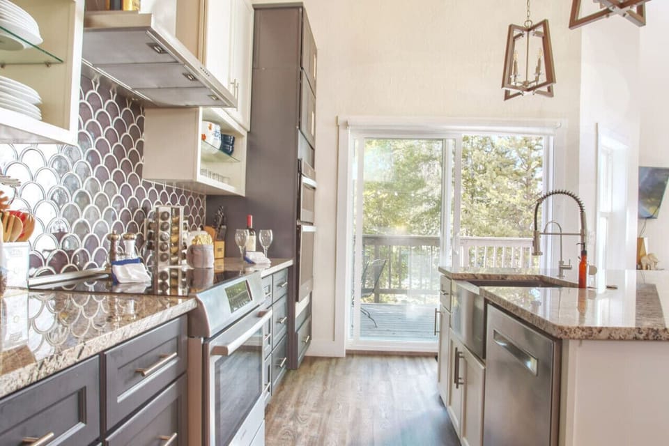 Fully stocked kitchen with access to deck