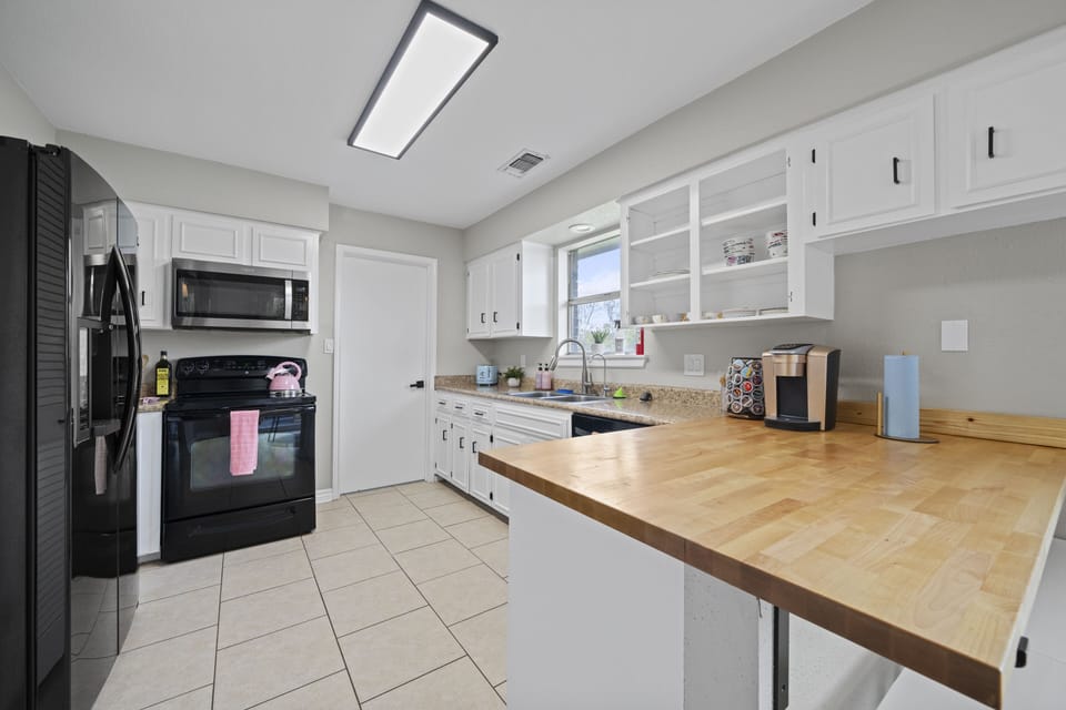 Whole area of the kitchen featuring spacious countertops