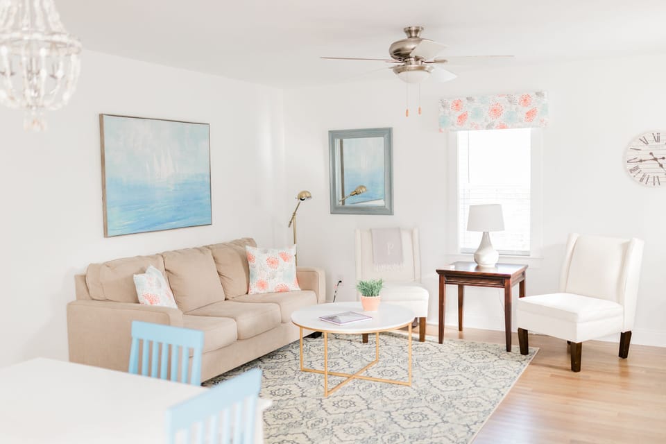 Open living room with sleeper sofa.