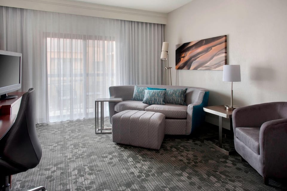Relax on the roomy sofa and recharge by the window.
