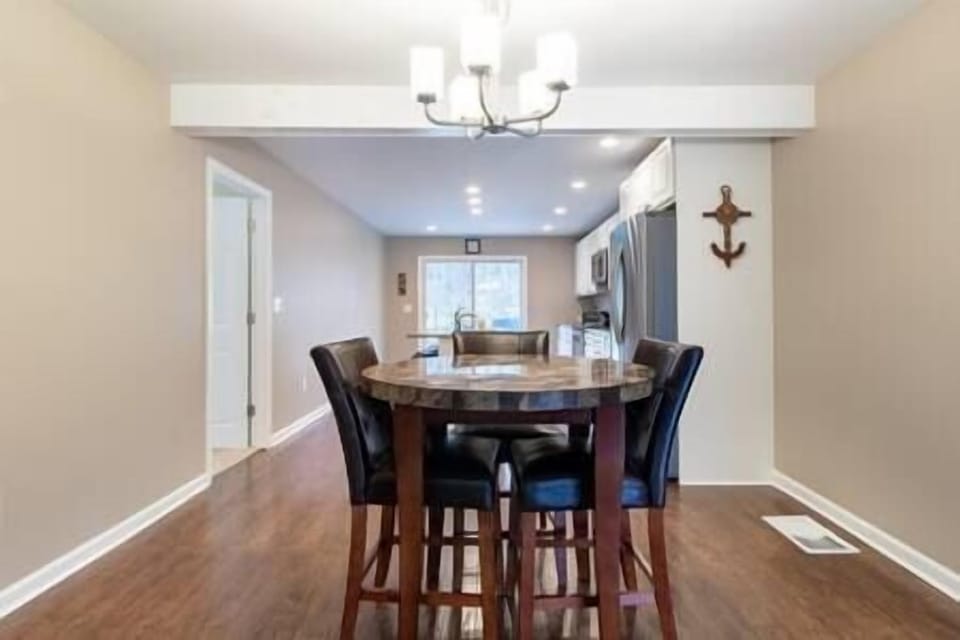 Dining table with four chairs.