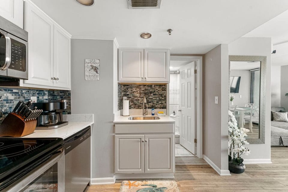 Fully Stocked Kitchen with Ocean Views, Stainless Steel Appliances and Bar Seating