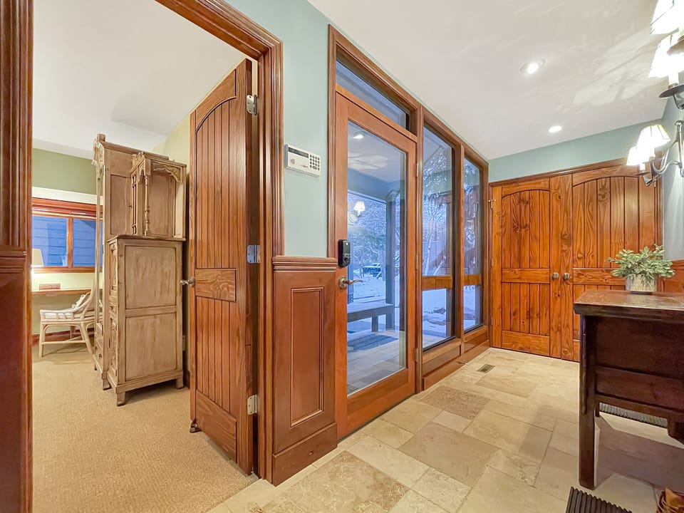 The entryway leads into the first floor king master suite