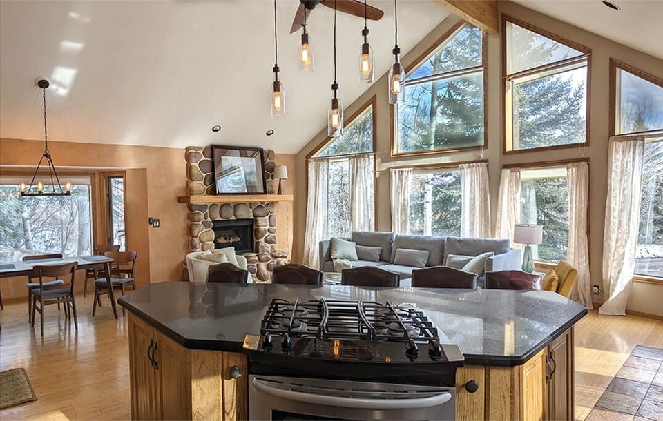 Light-filled Great Room: dining room, living room area and gourmet kitchen.
