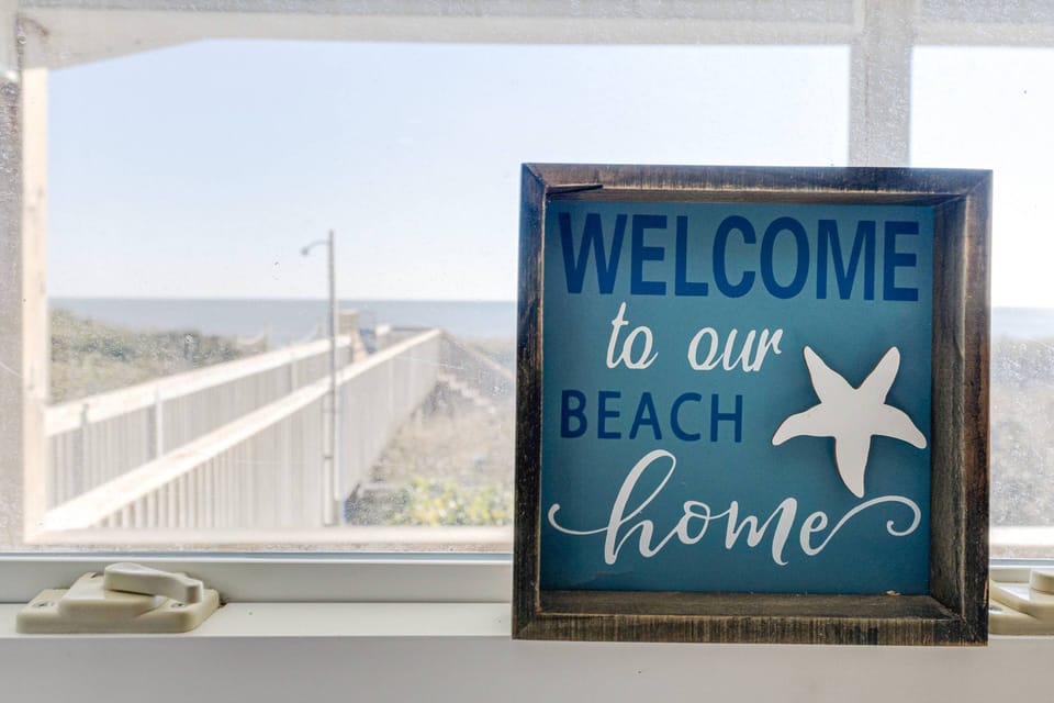 This says it all, we welcome you to our beach home.