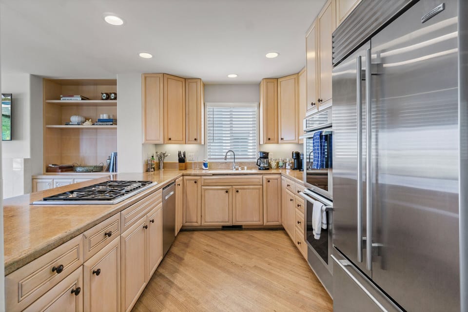 A full suite of appliances in the kitchen makes at-home meals and snacks a breeze.