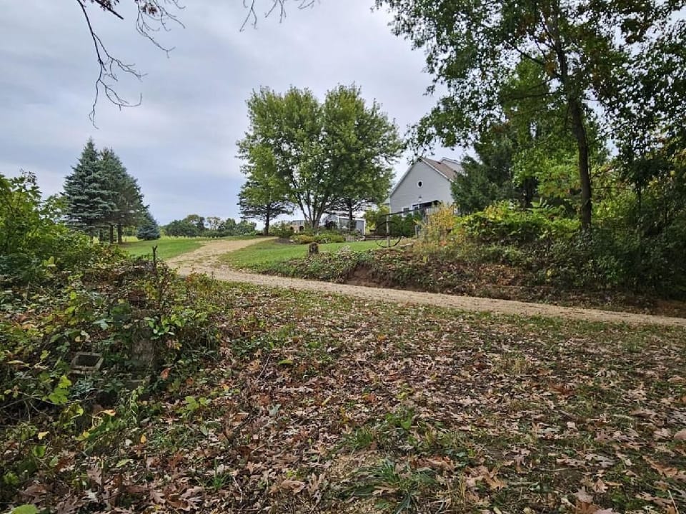 House is located on hillside property with spectacular views year around.