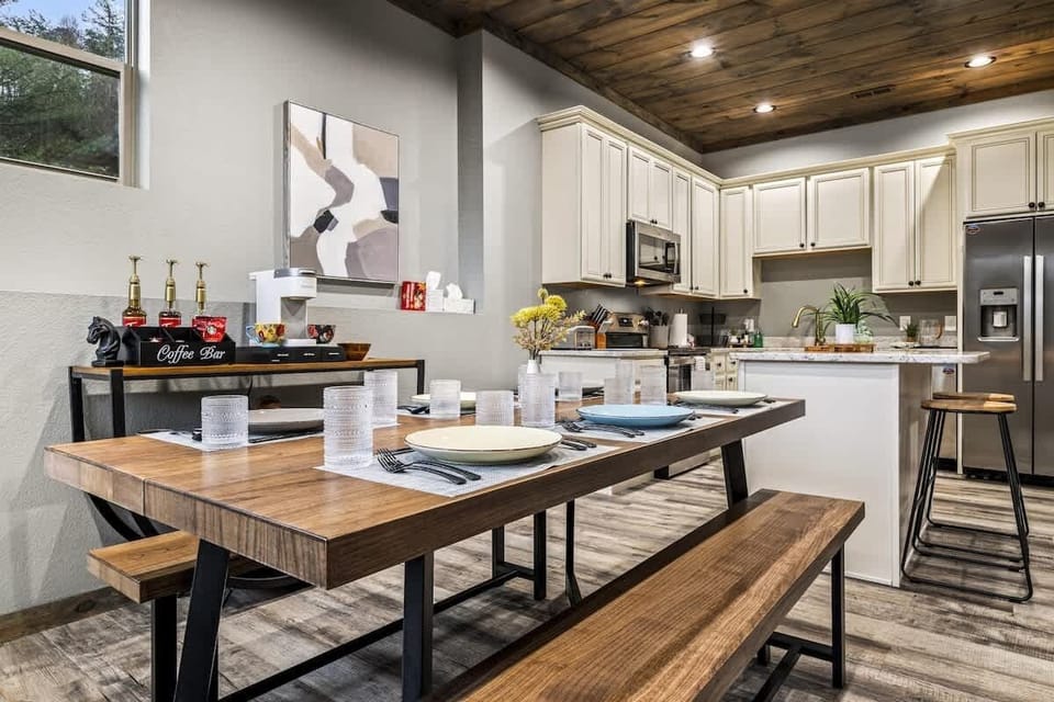 Enjoy meals and memories at this spacious farmhouse-style dining table, complete with a cozy coffee bar and fully stocked kitchen.